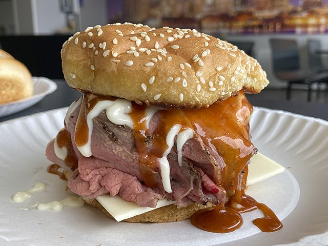 A thick roast beef sandwich.